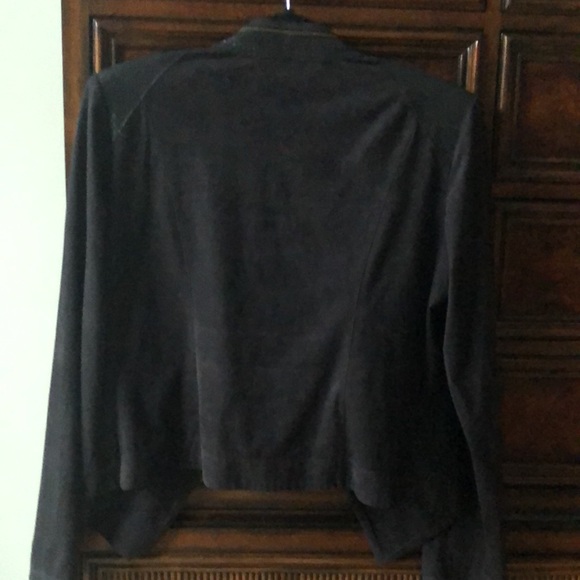 Light weight jacket that does not actually button or zip.  Cover up only. - Picture 3 of 3